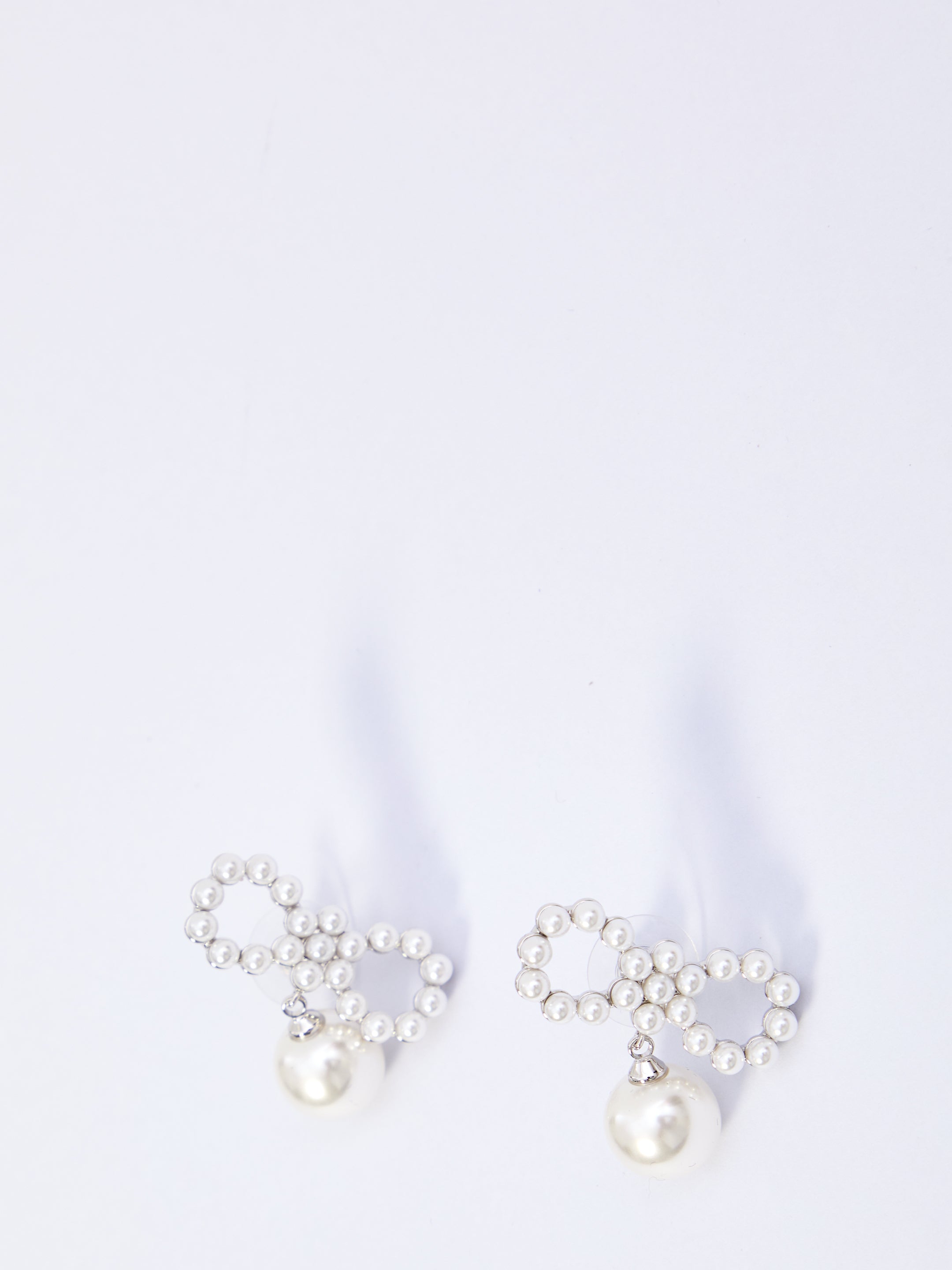 SELF PORTRAIT OS pearl bow earrings