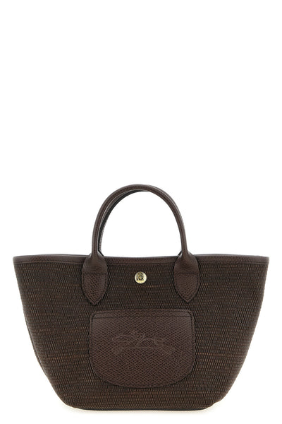 the longchamp xs le pliage handbag defines a compact basket silhouette