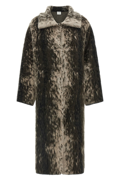 the nude coat redefines the volumes of contemporary outerwear through a straight