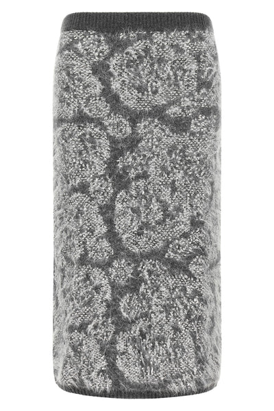 the midi skirt nude redefines knitwear through a straight and enveloping silhoue