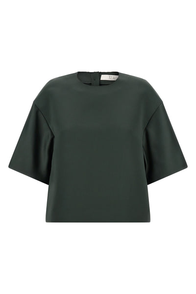 the emily tela crop blouse redefines the proportions of everyday wardrobe thro
