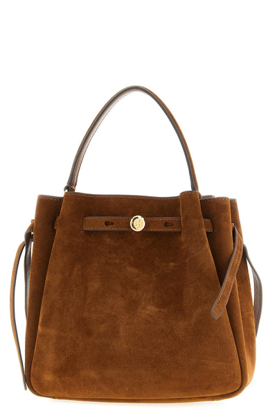 the tory burch romy bucket bag in fine caramel-colored suede stands out for a so