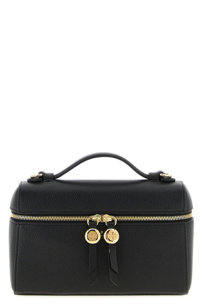 the tory burch romy slim handbag features a structured vanity case-inspired silh