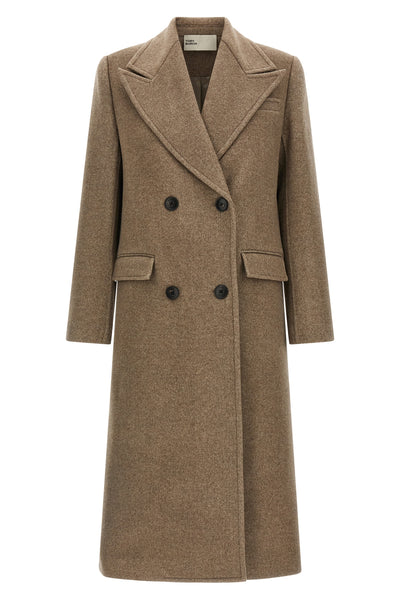 the tory burch coat defines a new concept of outerwear through sartorial volumes