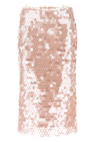 the tory burch skirt redefines the codes of the evening through a complex materi
