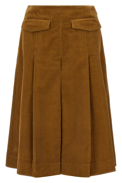 the pleated tory burch midi skirt defines a new concept of volume through a rigo