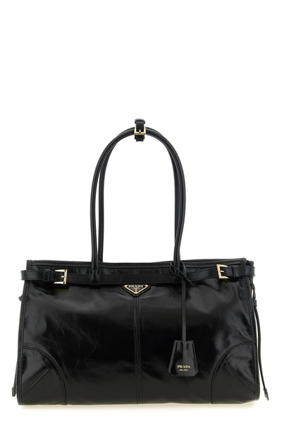the prada soft lux handbag in fine calf leather stands out for its glossy and so