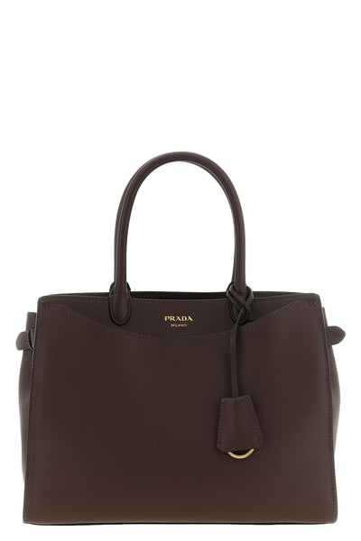 the prada prelude handbag in fine hammered calf leather embodies the essence o