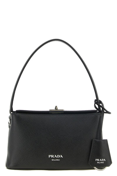the prada midi handbag is made of fine saffiano calf leather