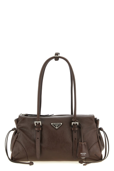 the prada bonnie brown calf leather shoulder bag is distinguished by a geometric