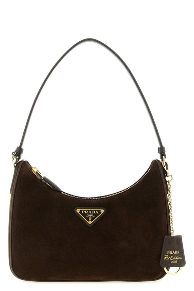 the prada re-edition 2005 mini shoulder bag reinterprets an archival silhouett