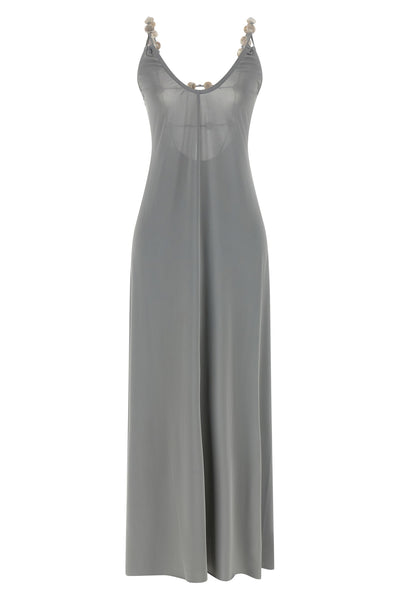 the long eres sculpturale dress defines the silhouette through a fluid and ela