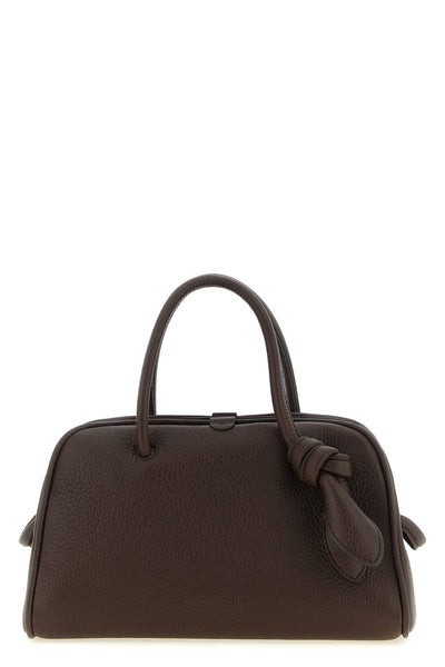 the jacquemus le petit turismo handbag reinterprets the classic bowling silhou