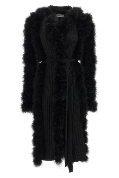 the attico long coat redefines the codes of knitwear through scenographic volume