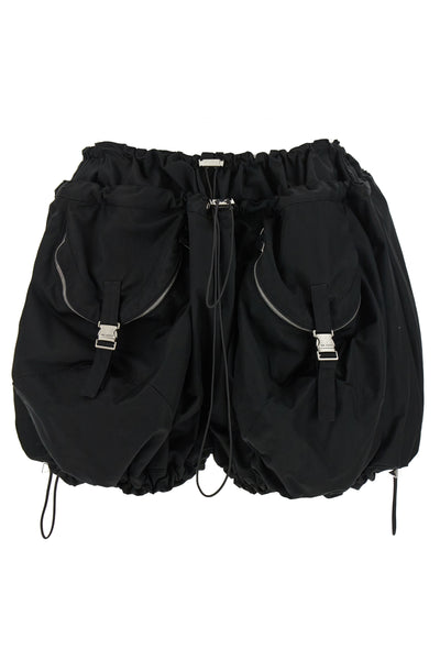 the attico shorts redefine the volumes of the contemporary wardrobe through a bo
