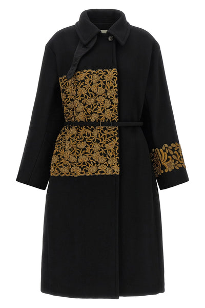 the dries van noten rain coat redefines the codes of outerwear through an aest