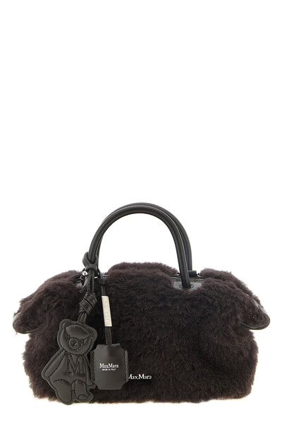 the max mara teddy holdals small handbag in a deep dark brown nuance is made o