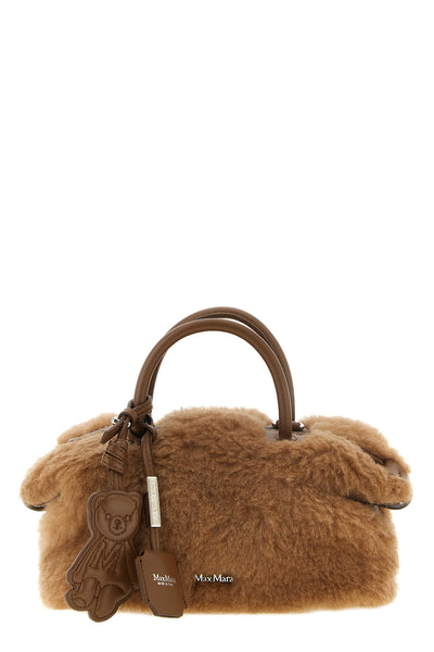 the max mara teddy holdals small handbag stands out for its iconic and volumin