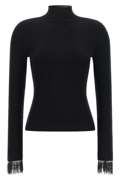 the twinset mock-knit redefines everyday elegance through impeccable sartorial c