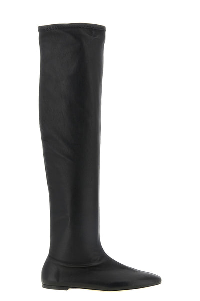the knee-high toteme boots set a new standard of contemporary luxury through a d