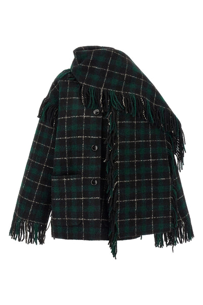 the toteme jacket redefines the codes of outerwear through a relaxed silhouette
