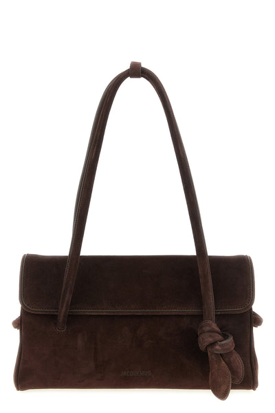 the jacquemus le turismo long shoulder bag stands out for its elongated silhou