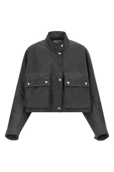 the prada jacket in structured technical fabric redefines the volumes of contemp