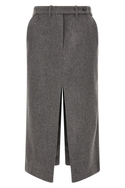the co longuette skirt embodies rigorous elegance through a structured silhouett