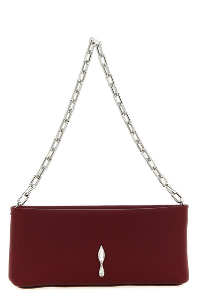 the christian louboutin maykimay clutch sets new standards of contemporary luxur