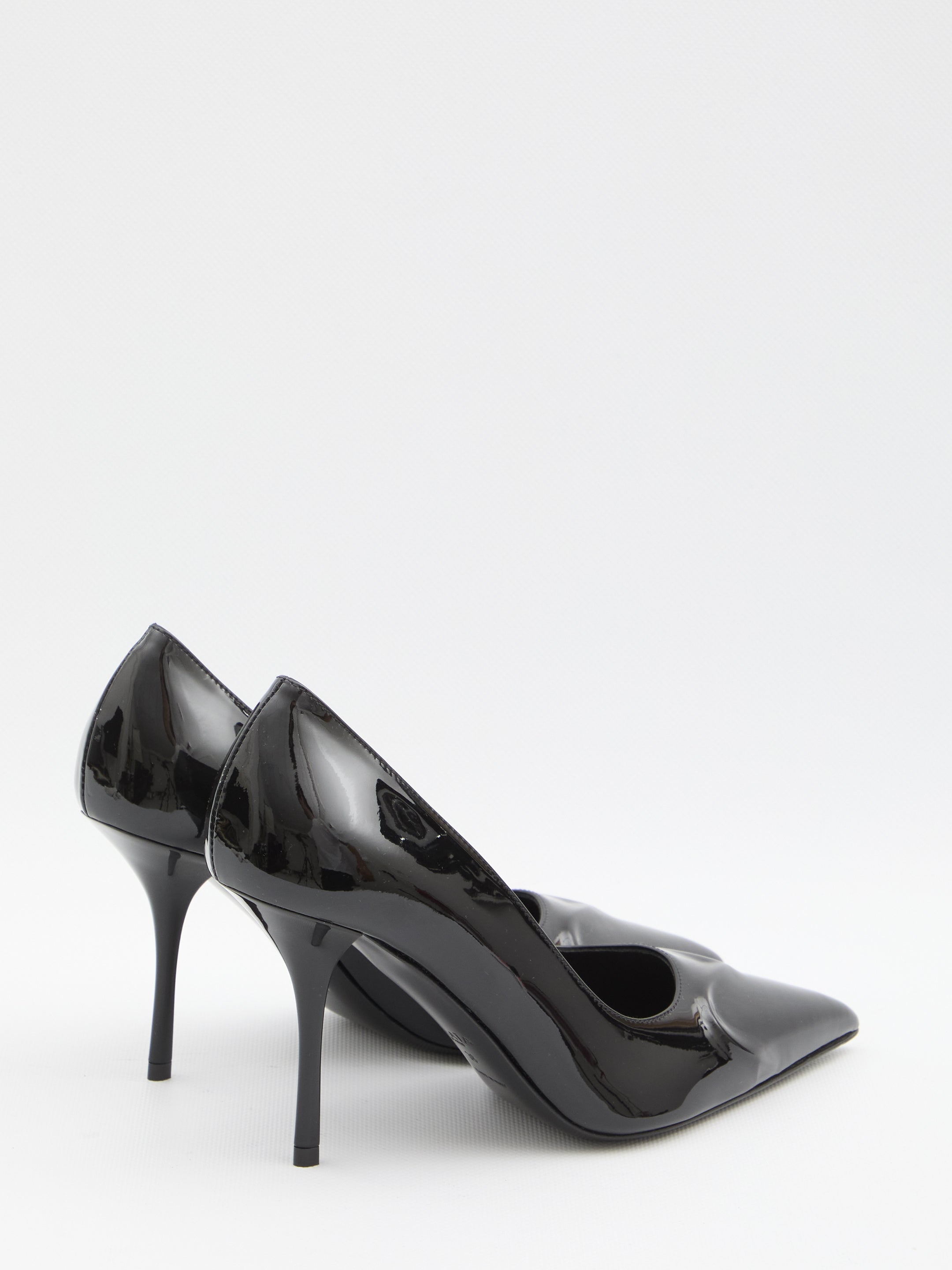ALAIA 36 black patent pumps