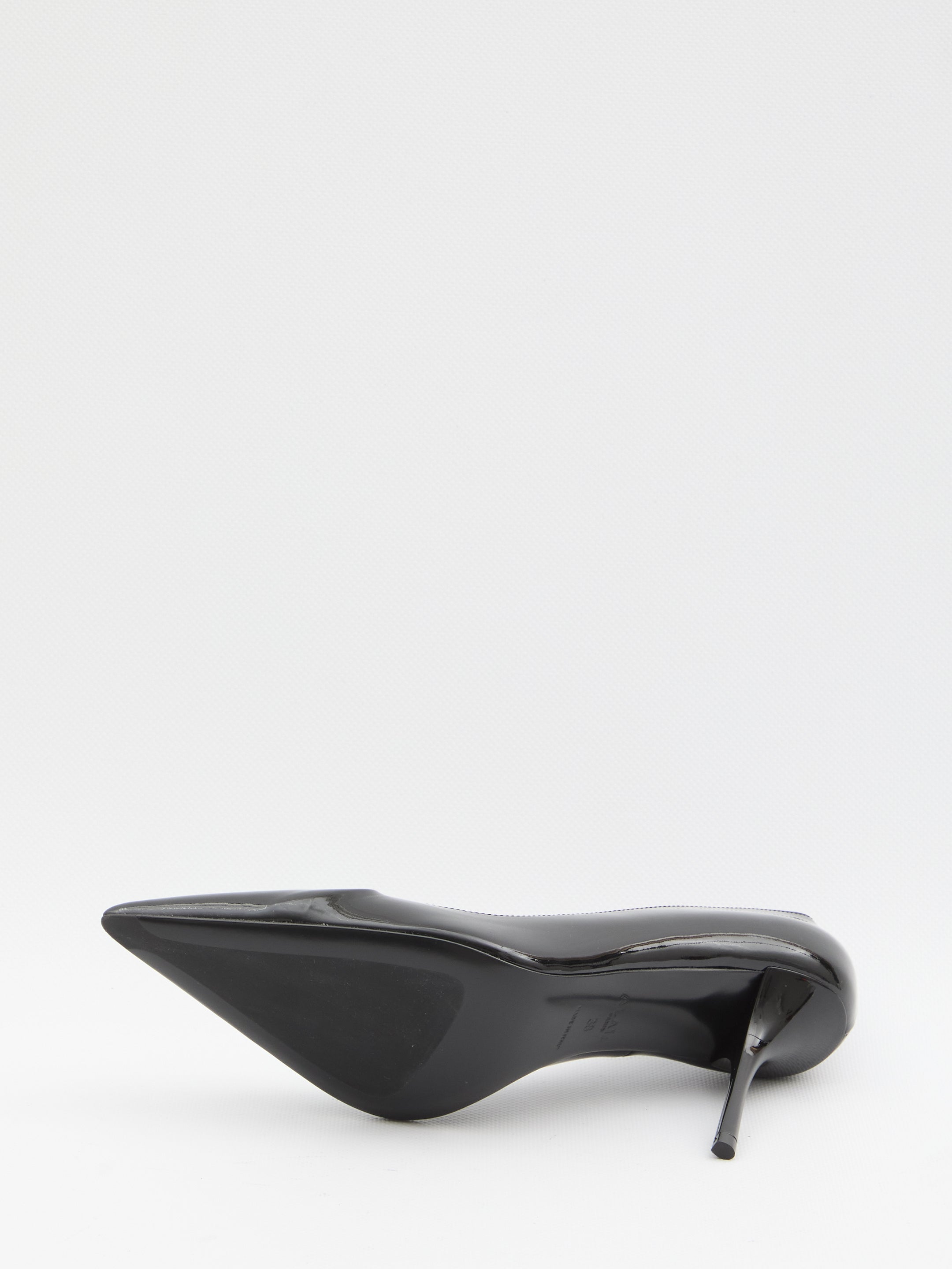 ALAIA 36 black patent pumps