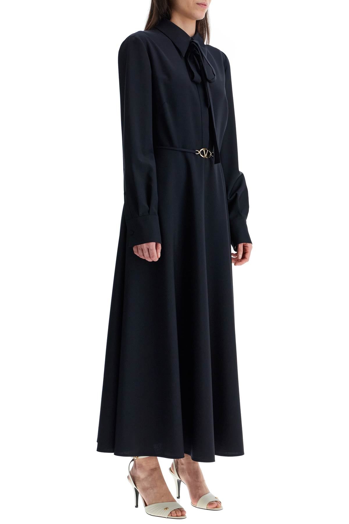 elegant navy blue wool dress with long sleeves and golden belt