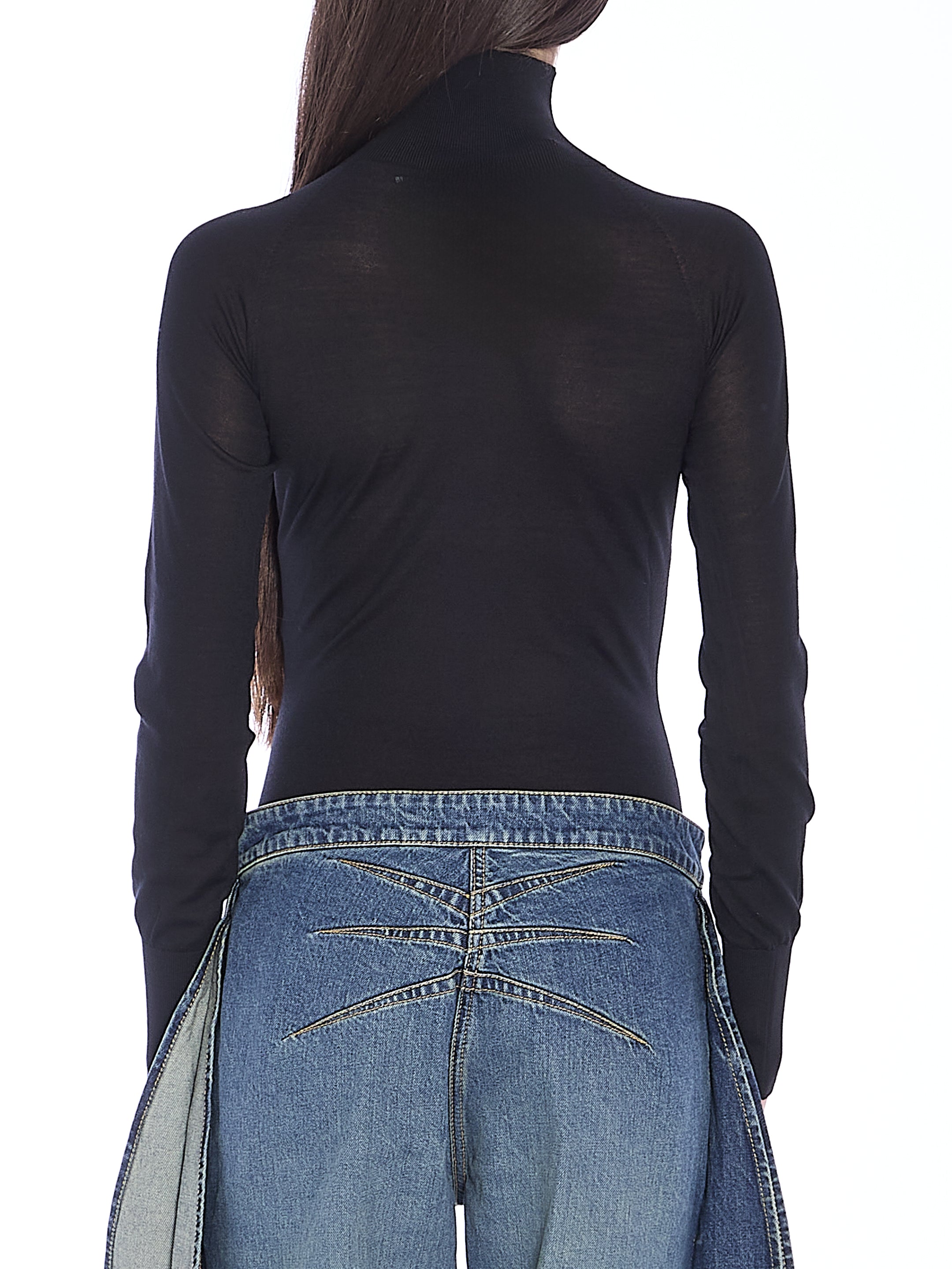 ALAIA 38 bodysuit in sheer knit