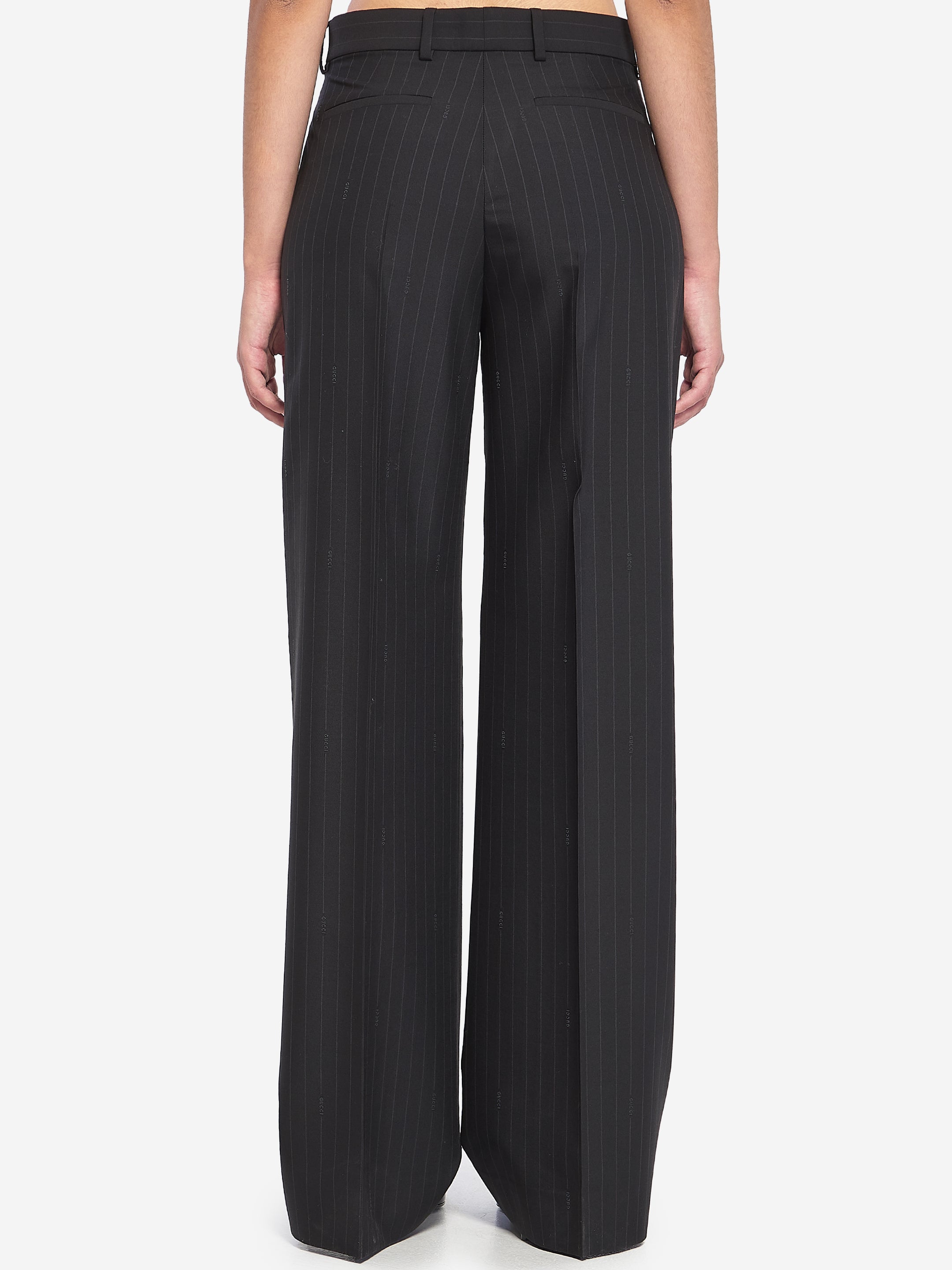 GUCCI 44 pinstriped wool trousers