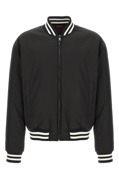 reversible bomber jacket in solid color technical nylon twill and gg pattern
