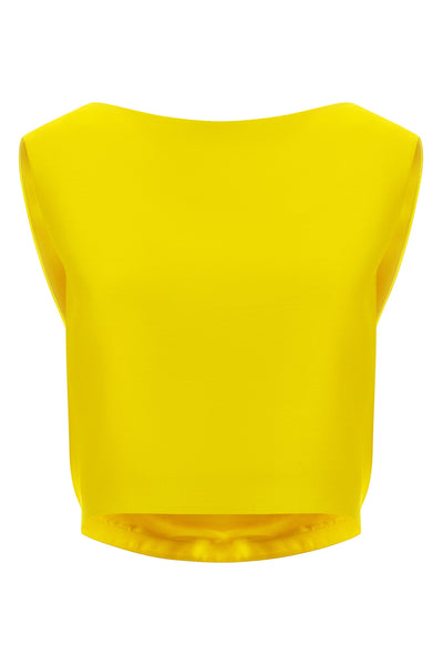 the balenciaga draped back top presents a rigorous study of sculptural contrasts