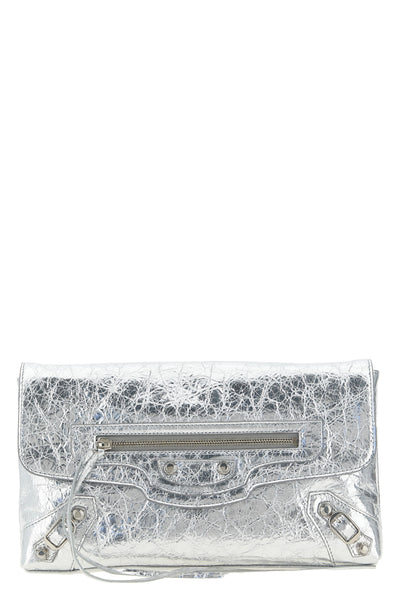 the balenciaga le city clutch bag in pure arena lambskin leather stands out fo