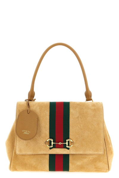 guccis paparazzo handbag sets new standards of craftsmanship excellence throu