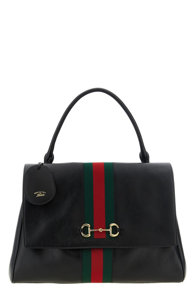 the gucci paparazzo large handbag redefines the codes of the historical archiv