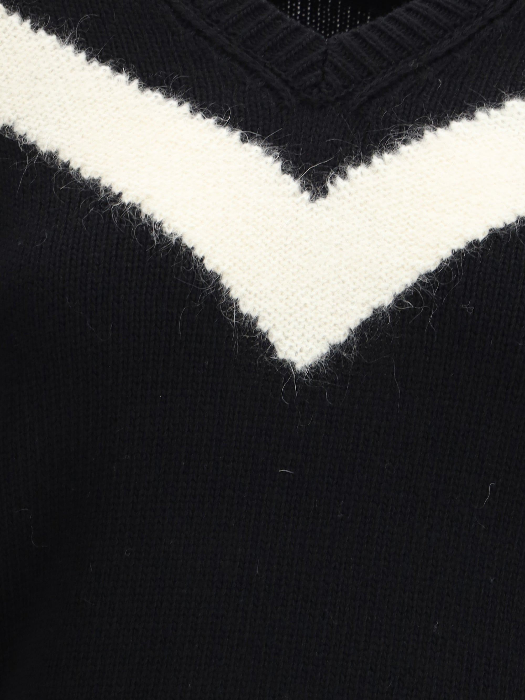 VALENTINO M wool sweater with a bow at the back