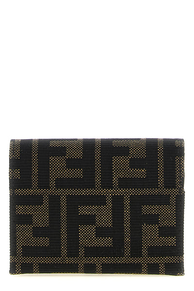 the fendi cardholder is distinguished by a compact folding construction