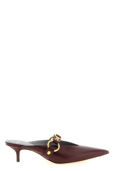 the balenciaga city mule defines a rigorous aesthetic through its sharp pointed