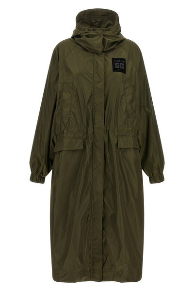 the ganni long windbreaker redefines the volumes of contemporary outerwear throu