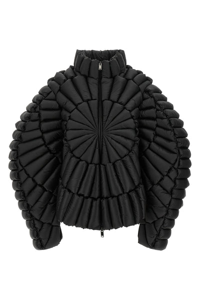 the raxxy down jacket redefines the volumes of outerwear through a complex three