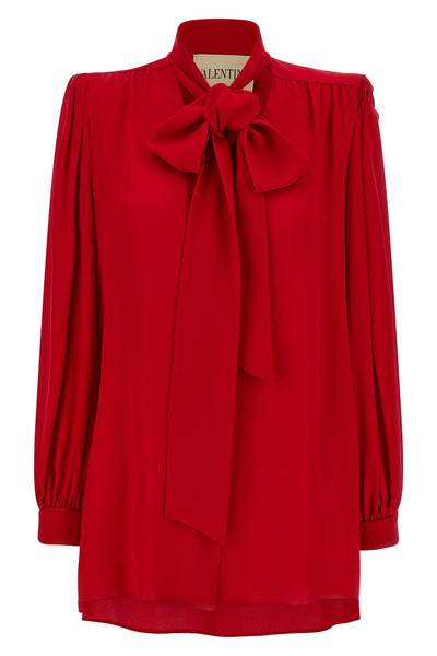 the valentino garavani bow shirt features a fluid tailored silhouette