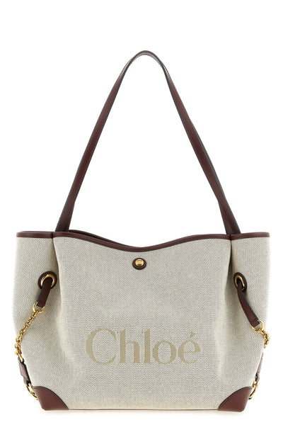 the chloé clover shoulder bag in cotton canvas stands out for its versatile silh