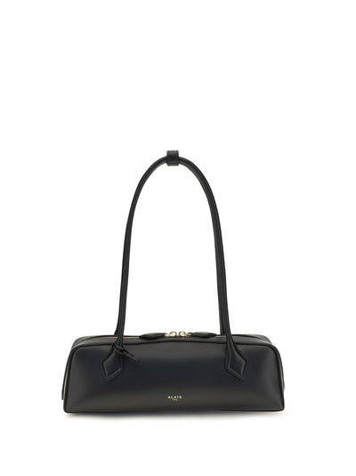 small le teckel shoulder bag