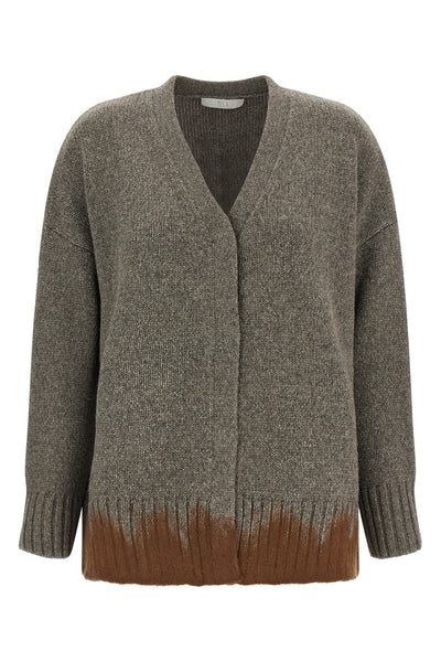 the tela tawan cardigan redefines contemporary knitwear through a bold play of c