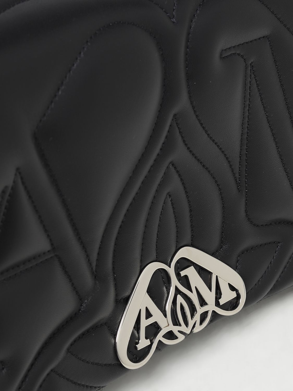 MCQUEEN OS seal bag in leather with quilted monogram