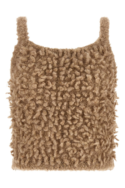 peserico cropped top redefines contemporary knitwear through tactile volumes and